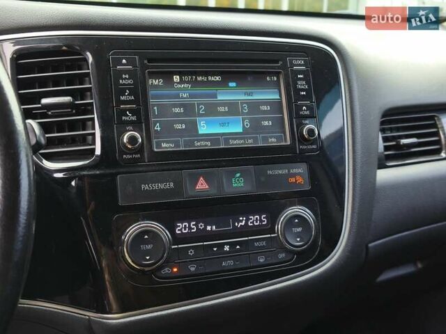 Чорний Міцубісі Аутлендер, об'ємом двигуна 2.36 л та пробігом 162 тис. км за 14450 $, фото 17 на Automoto.ua
