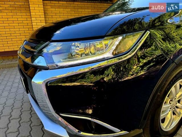 Чорний Міцубісі Аутлендер, об'ємом двигуна 2.36 л та пробігом 130 тис. км за 13500 $, фото 14 на Automoto.ua
