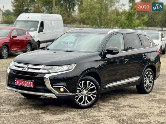 Чорний Міцубісі Аутлендер, об'ємом двигуна 2.2 л та пробігом 188 тис. км за 16999 $, фото 1 на Automoto.ua