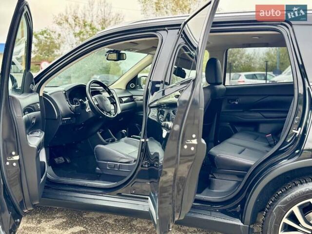 Чорний Міцубісі Аутлендер, об'ємом двигуна 2.2 л та пробігом 188 тис. км за 16999 $, фото 41 на Automoto.ua