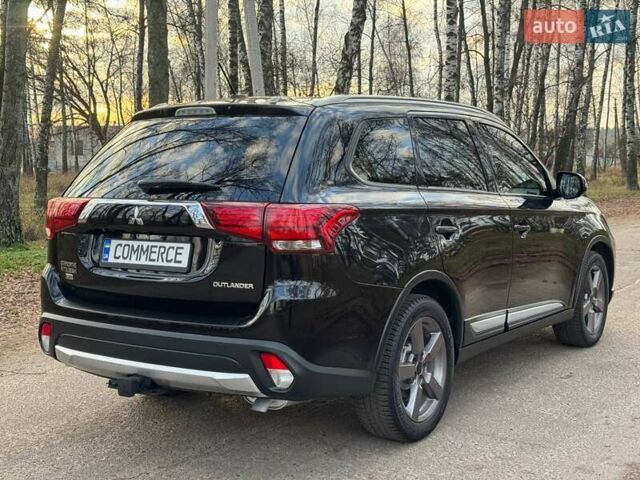 Черный Мицубиси Аутлендер, объемом двигателя 3 л и пробегом 99 тыс. км за 15800 $, фото 15 на Automoto.ua
