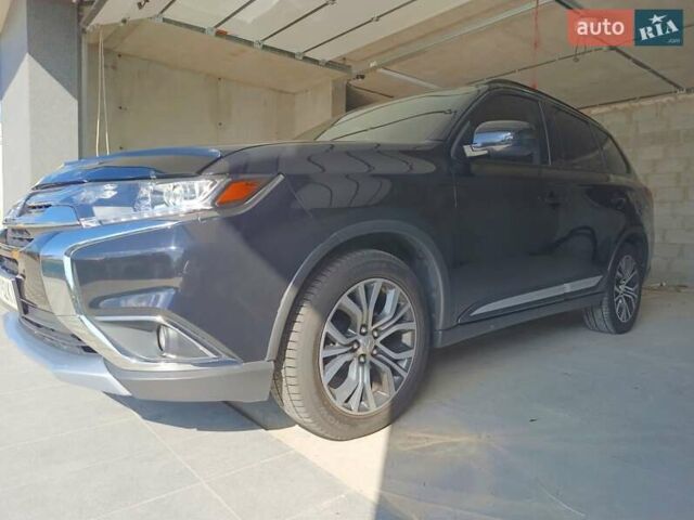 Черный Мицубиси Аутлендер, объемом двигателя 2.36 л и пробегом 120 тыс. км за 16900 $, фото 20 на Automoto.ua