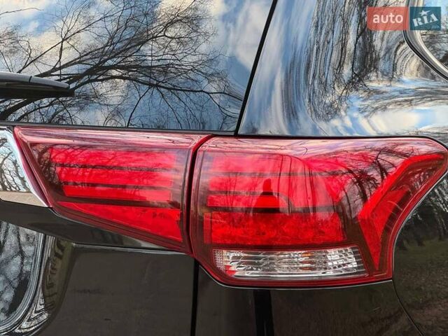 Черный Мицубиси Аутлендер, объемом двигателя 3 л и пробегом 99 тыс. км за 15800 $, фото 16 на Automoto.ua