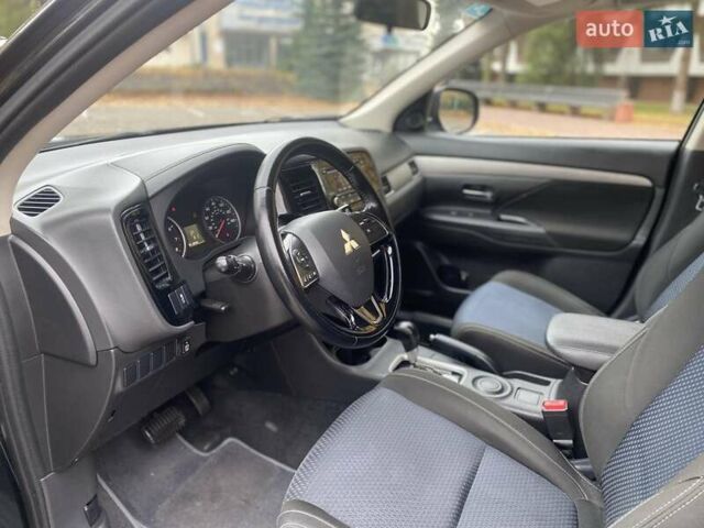 Чорний Міцубісі Аутлендер, об'ємом двигуна 2.36 л та пробігом 192 тис. км за 14200 $, фото 13 на Automoto.ua