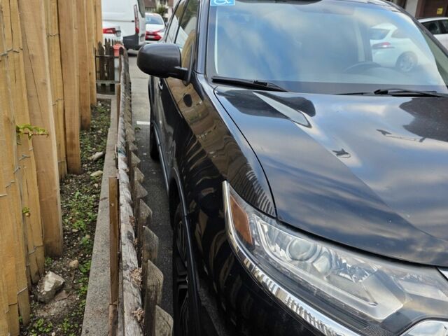 Чорний Міцубісі Аутлендер, об'ємом двигуна 2.4 л та пробігом 195 тис. км за 15138 $, фото 1 на Automoto.ua