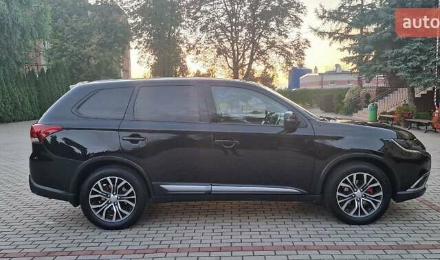 Черный Мицубиси Аутлендер, объемом двигателя 2.36 л и пробегом 168 тыс. км за 14999 $, фото 8 на Automoto.ua