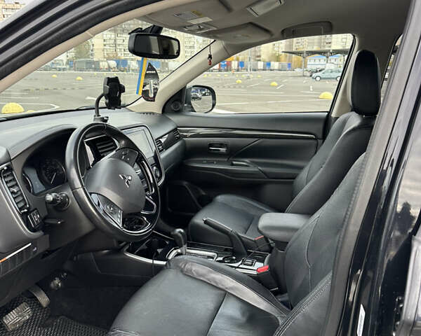 Чорний Міцубісі Аутлендер, об'ємом двигуна 2.36 л та пробігом 166 тис. км за 17100 $, фото 14 на Automoto.ua