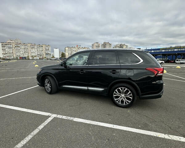 Чорний Міцубісі Аутлендер, об'ємом двигуна 2.36 л та пробігом 166 тис. км за 17100 $, фото 2 на Automoto.ua