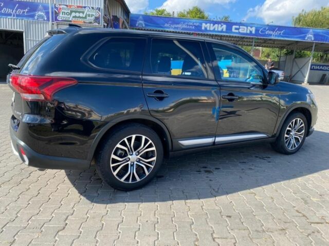 Чорний Міцубісі Аутлендер, об'ємом двигуна 2.4 л та пробігом 120 тис. км за 16000 $, фото 1 на Automoto.ua