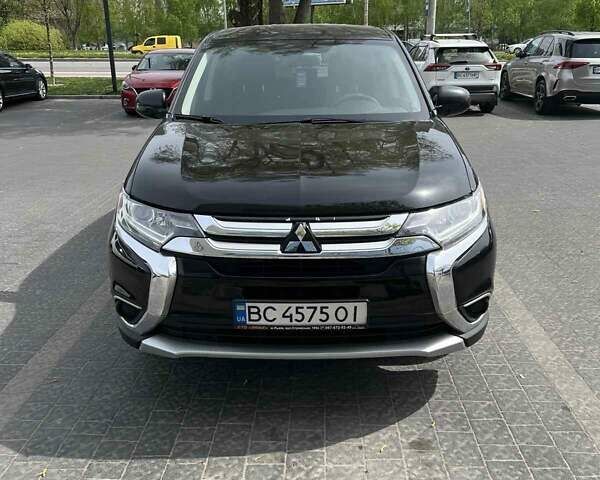 Чорний Міцубісі Аутлендер, об'ємом двигуна 2.36 л та пробігом 119 тис. км за 14200 $, фото 6 на Automoto.ua