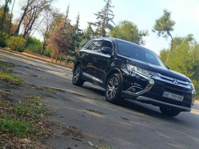 Черный Мицубиси Аутлендер, объемом двигателя 2.4 л и пробегом 156 тыс. км за 330 $, фото 4 на Automoto.ua
