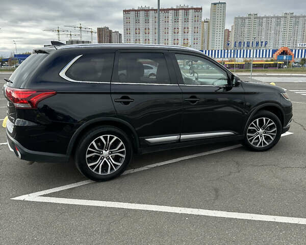 Чорний Міцубісі Аутлендер, об'ємом двигуна 2.36 л та пробігом 166 тис. км за 17100 $, фото 4 на Automoto.ua