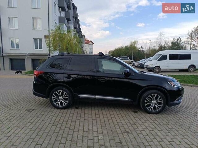 Черный Мицубиси Аутлендер, объемом двигателя 2.36 л и пробегом 187 тыс. км за 14400 $, фото 22 на Automoto.ua