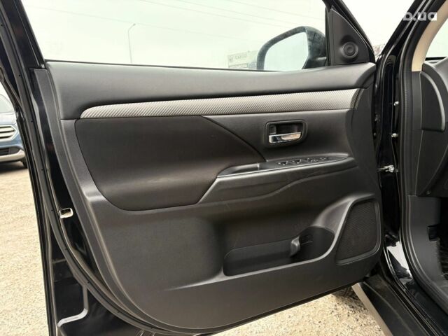 Чорний Міцубісі Аутлендер, об'ємом двигуна 2.4 л та пробігом 110 тис. км за 17290 $, фото 15 на Automoto.ua