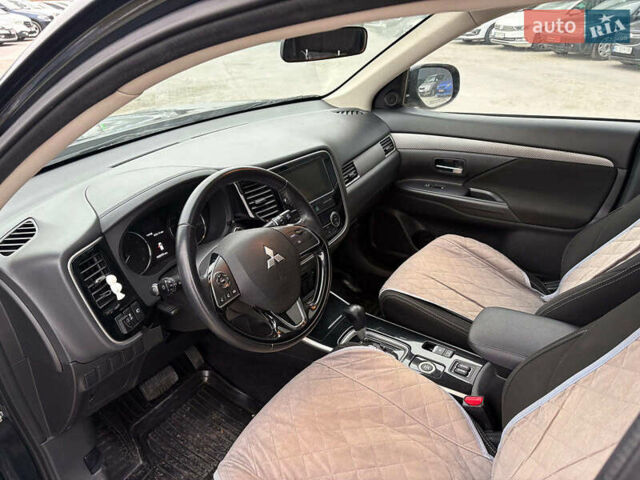 Чорний Міцубісі Аутлендер, об'ємом двигуна 2.4 л та пробігом 110 тис. км за 17290 $, фото 18 на Automoto.ua