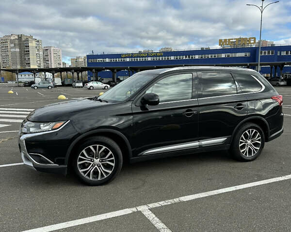 Чорний Міцубісі Аутлендер, об'ємом двигуна 2.36 л та пробігом 166 тис. км за 17100 $, фото 21 на Automoto.ua