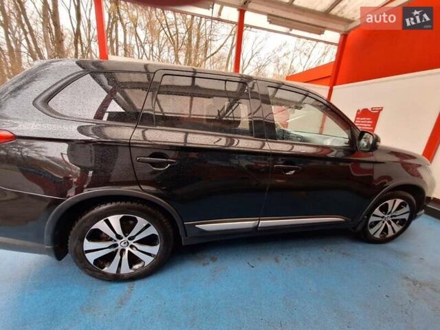 Чорний Міцубісі Аутлендер, об'ємом двигуна 2 л та пробігом 114 тис. км за 17600 $, фото 3 на Automoto.ua