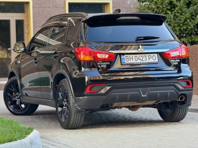 Черный Мицубиси Аутлендер, объемом двигателя 2.4 л и пробегом 130 тыс. км за 13900 $, фото 6 на Automoto.ua