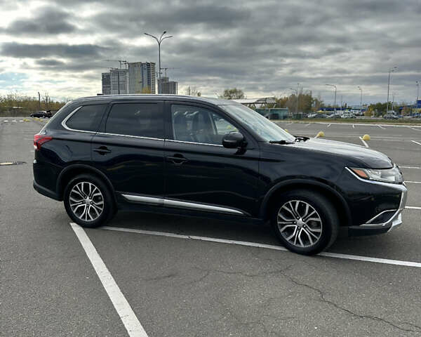 Чорний Міцубісі Аутлендер, об'ємом двигуна 2.36 л та пробігом 166 тис. км за 17100 $, фото 31 на Automoto.ua