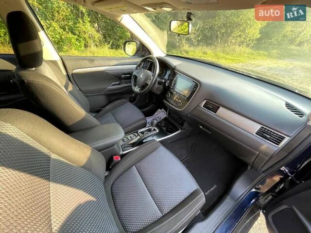 Черный Мицубиси Аутлендер, объемом двигателя 2.4 л и пробегом 221 тыс. км за 11900 $, фото 17 на Automoto.ua