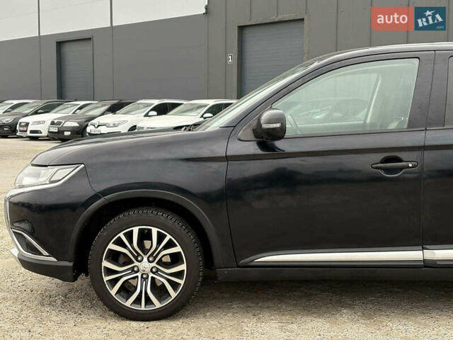 Чорний Міцубісі Аутлендер, об'ємом двигуна 2.4 л та пробігом 110 тис. км за 17290 $, фото 12 на Automoto.ua