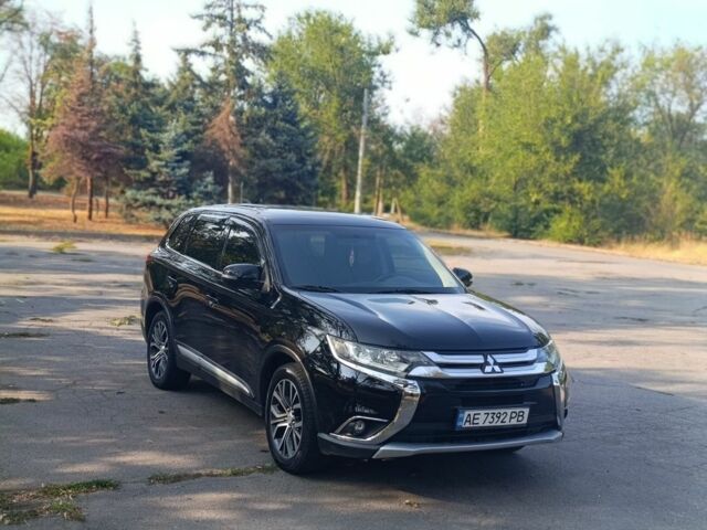 Черный Мицубиси Аутлендер, объемом двигателя 2.4 л и пробегом 156 тыс. км за 330 $, фото 2 на Automoto.ua