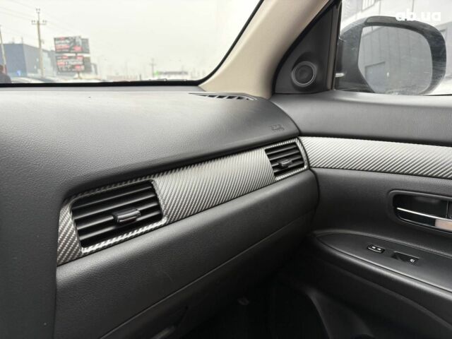 Чорний Міцубісі Аутлендер, об'ємом двигуна 2.4 л та пробігом 110 тис. км за 17290 $, фото 24 на Automoto.ua