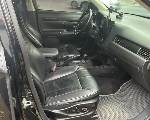 Чорний Міцубісі Аутлендер, об'ємом двигуна 2.36 л та пробігом 150 тис. км за 13500 $, фото 9 на Automoto.ua