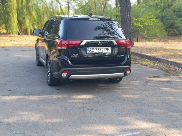 Черный Мицубиси Аутлендер, объемом двигателя 2.4 л и пробегом 156 тыс. км за 330 $, фото 9 на Automoto.ua