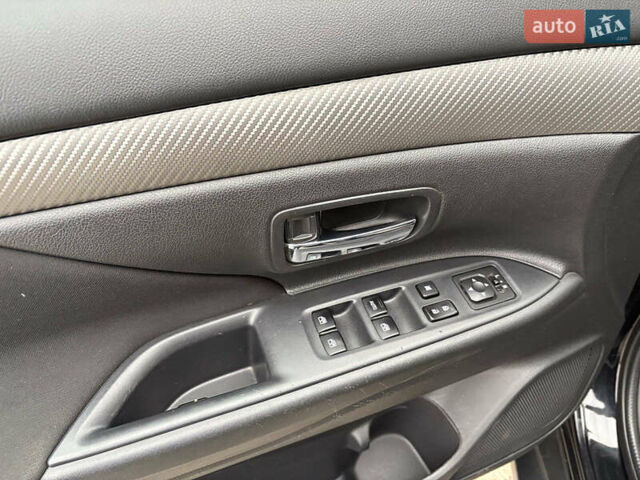 Чорний Міцубісі Аутлендер, об'ємом двигуна 2.4 л та пробігом 110 тис. км за 17290 $, фото 16 на Automoto.ua