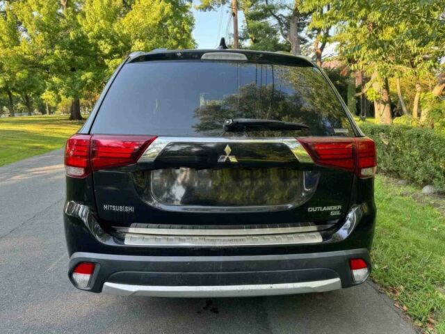 Черный Мицубиси Аутлендер, объемом двигателя 2.4 л и пробегом 66 тыс. км за 10650 $, фото 5 на Automoto.ua