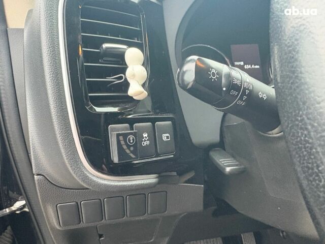 Чорний Міцубісі Аутлендер, об'ємом двигуна 2.4 л та пробігом 110 тис. км за 17290 $, фото 17 на Automoto.ua