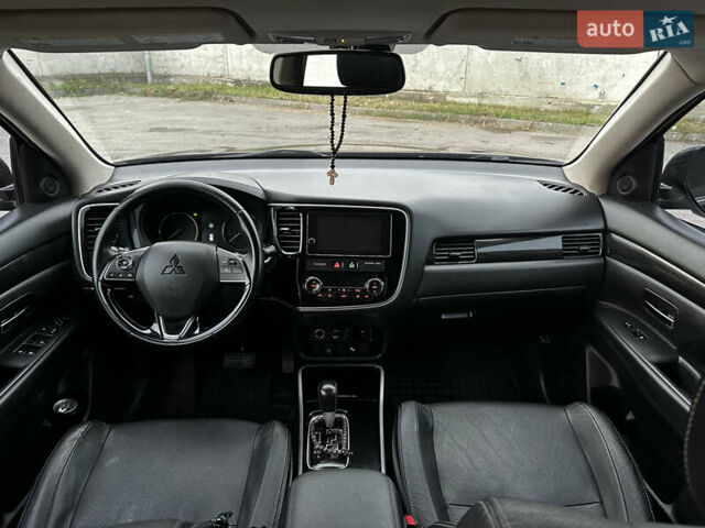 Черный Мицубиси Аутлендер, объемом двигателя 2.36 л и пробегом 128 тыс. км за 15500 $, фото 13 на Automoto.ua
