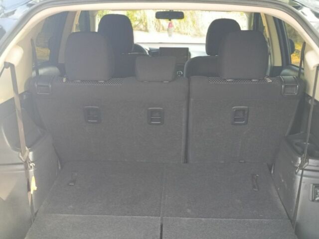 Черный Мицубиси Аутлендер, объемом двигателя 2.4 л и пробегом 156 тыс. км за 330 $, фото 16 на Automoto.ua