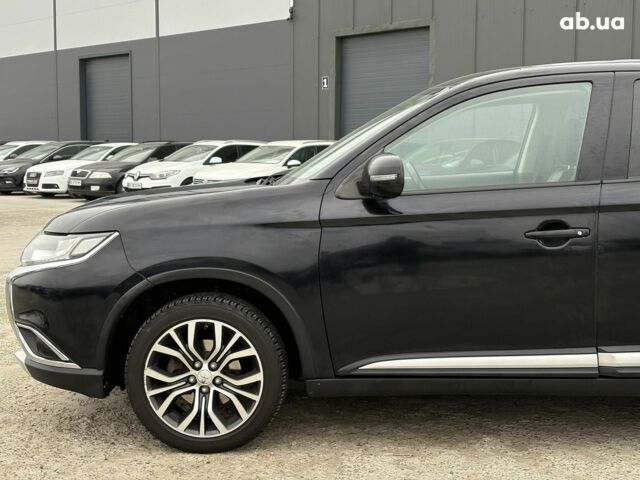 Чорний Міцубісі Аутлендер, об'ємом двигуна 2.4 л та пробігом 110 тис. км за 17290 $, фото 12 на Automoto.ua