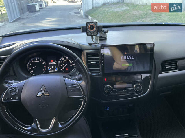 Чорний Міцубісі Аутлендер, об'ємом двигуна 2.36 л та пробігом 150 тис. км за 13500 $, фото 7 на Automoto.ua