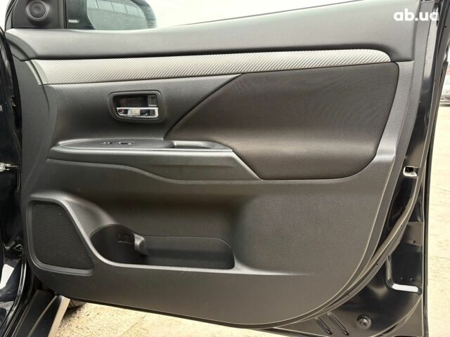 Чорний Міцубісі Аутлендер, об'ємом двигуна 2.4 л та пробігом 110 тис. км за 17290 $, фото 28 на Automoto.ua