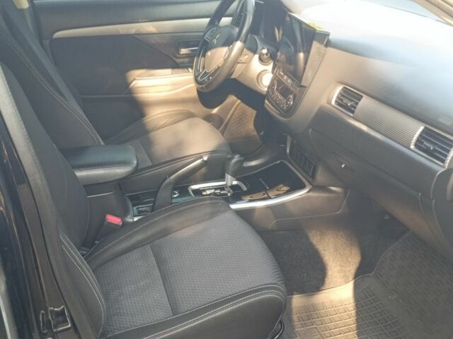 Черный Мицубиси Аутлендер, объемом двигателя 2.4 л и пробегом 156 тыс. км за 330 $, фото 11 на Automoto.ua