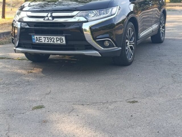 Черный Мицубиси Аутлендер, объемом двигателя 2.4 л и пробегом 156 тыс. км за 330 $, фото 6 на Automoto.ua