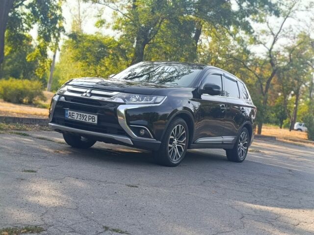 Черный Мицубиси Аутлендер, объемом двигателя 2.4 л и пробегом 156 тыс. км за 330 $, фото 7 на Automoto.ua