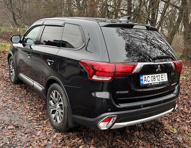 Чорний Міцубісі Аутлендер, об'ємом двигуна 2.36 л та пробігом 110 тис. км за 17500 $, фото 5 на Automoto.ua