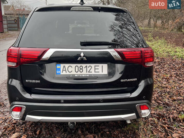Чорний Міцубісі Аутлендер, об'ємом двигуна 2.36 л та пробігом 110 тис. км за 17500 $, фото 4 на Automoto.ua
