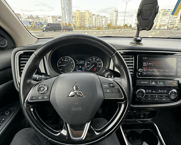 Чорний Міцубісі Аутлендер, об'ємом двигуна 2.36 л та пробігом 166 тис. км за 17100 $, фото 12 на Automoto.ua