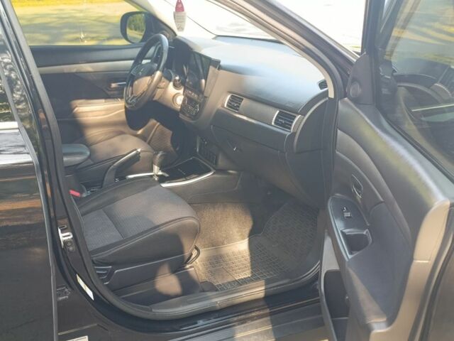 Черный Мицубиси Аутлендер, объемом двигателя 2.4 л и пробегом 156 тыс. км за 330 $, фото 12 на Automoto.ua