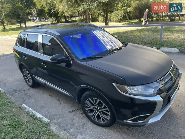 Чорний Міцубісі Аутлендер, об'ємом двигуна 2.36 л та пробігом 150 тис. км за 13500 $, фото 5 на Automoto.ua