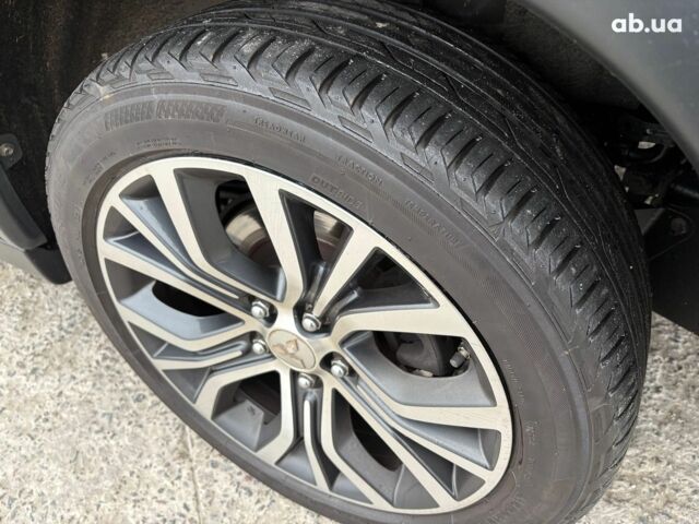 Чорний Міцубісі Аутлендер, об'ємом двигуна 2.4 л та пробігом 110 тис. км за 17290 $, фото 38 на Automoto.ua