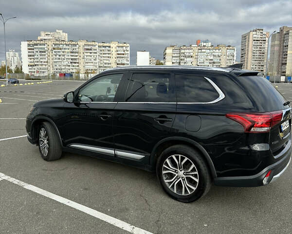 Чорний Міцубісі Аутлендер, об'ємом двигуна 2.36 л та пробігом 166 тис. км за 17100 $, фото 27 на Automoto.ua