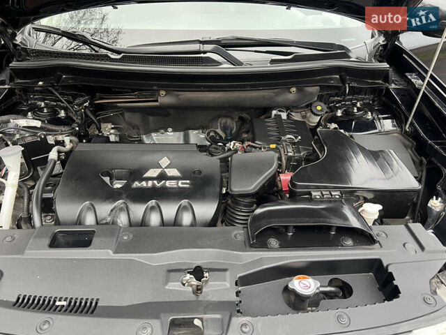 Чорний Міцубісі Аутлендер, об'ємом двигуна 2.36 л та пробігом 110 тис. км за 17500 $, фото 17 на Automoto.ua