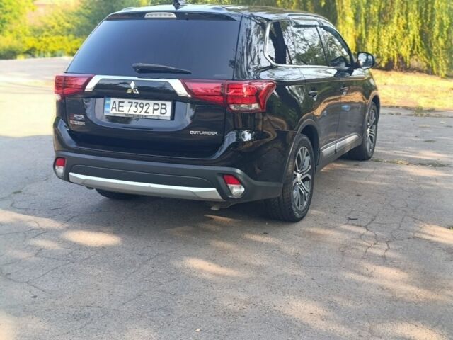 Черный Мицубиси Аутлендер, объемом двигателя 2.4 л и пробегом 156 тыс. км за 330 $, фото 10 на Automoto.ua