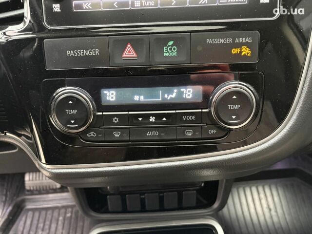 Чорний Міцубісі Аутлендер, об'ємом двигуна 2.4 л та пробігом 110 тис. км за 17290 $, фото 26 на Automoto.ua